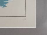 a picture of a blue and white painting on a wall