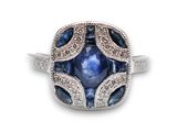 une bague en or blanc 18 carats sertie d'un saphir bleu et de diamants