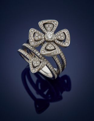 a diamond and white gold ring, by business