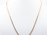 a gold chain necklace on a mannequin mannequin mannequin mannequin mannequin mannequin mannequin mannequin manne