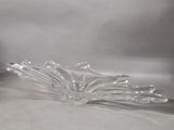 a glass bowl that is sitting on a table