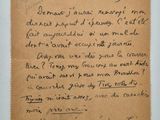 un gros plan d'un morceau de papier sur lequel on a écrit