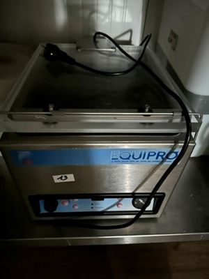 an image of a commercial fryer sitting on top of a counter