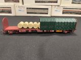 a toy train that has rolls of toilet paper on it