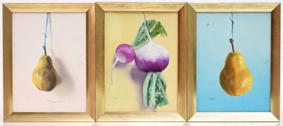 three framed paintings of fruit and vegetables hanging on a wall