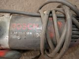 a picture of a close up of a drill on a table