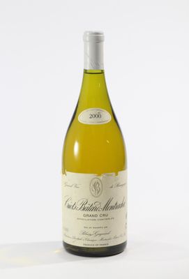 a bottle of wine that is sitting on a table