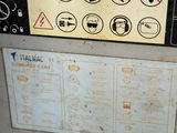 une photo d'un panneau apposé sur le côté d'une machine