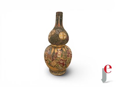 a vase that has a design on it