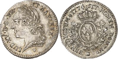 une pièce d'argent sur laquelle figure l'effigie d'un homme coiffé d'une couronne
