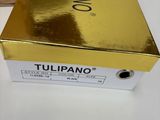 a box of tulipano perfume sitting on top of a table