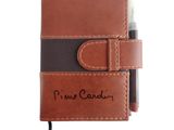 un carnet en cuir marron auquel sont fixés un stylo et un bloc-notes