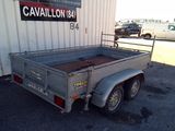 an image of a trailer parked in front of a building