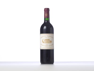 a bottle of wine that is sitting on a table