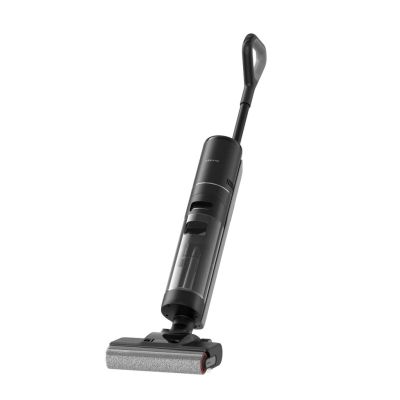 un gros plan d'un aspirateur noir sur fond blanc