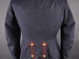 the back of a military jacket with red pips on it