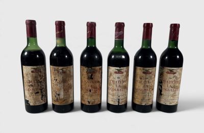 six bouteilles de vin sont alignées dans une rangée