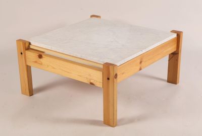 a small wooden table with a marble top on a white background