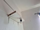 a camera mounted to the ceiling of a room