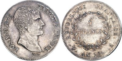 a close up of a coin on a white background