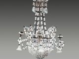 a crystal chandelier hanging from a ceiling in a room