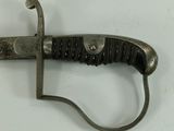 a knife that is laying on top of a table