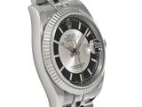 a close up of a wrist watch with a black dial