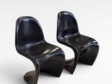 two black plastic chairs sitting side by side on a white surface