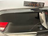a sticker that says vauto on the back of a car