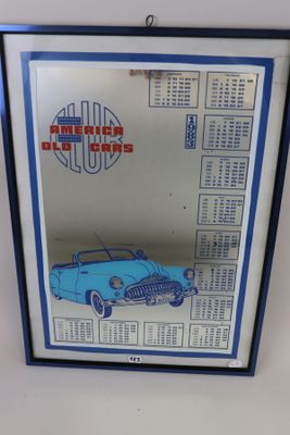 a framed picture of a blue car in a blue frame