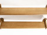 pair of wooden shelves on a white background with no one in the photo