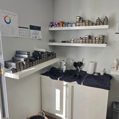 a kitchen with a lot of items on the shelves