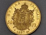 l'image d'une pièce d'or sur laquelle figurent des armoiries