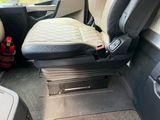 a seat in the back of a car with a safety belt