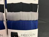 two pairs of men ' s socks are on display in a store