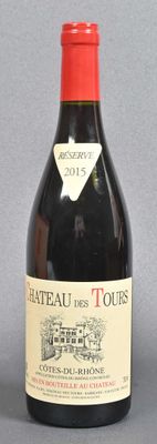 bottle of red wine with a red cap on a grey background