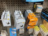 many different types of electronics on display in a store