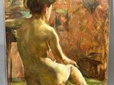 an oil painting of a woman sitting on a green rug