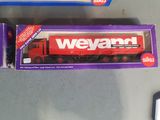 a toy truck that is sitting in a box