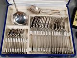 a box of silverware with spoons and spoons in it