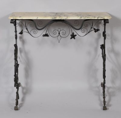 Console à structure en fer forgé noirci à volutes et fleurs …