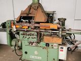 a picture of a machine that is sitting in a garage
