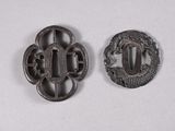 two antique iron buckles with a dragon and a dragon on them