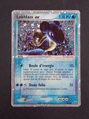 a close up of a pokemon card with a blue background