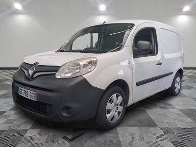 a picture of a white van parked on a checkered floor