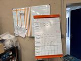 an image of a bulletin board in the corner of a room