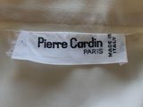 the label on the shirt reads pierre cardin paris