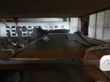 an image of a car being worked on in a garage