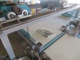 a machine that is working on a sheet of paper