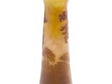 a vase that is sitting on a white surface